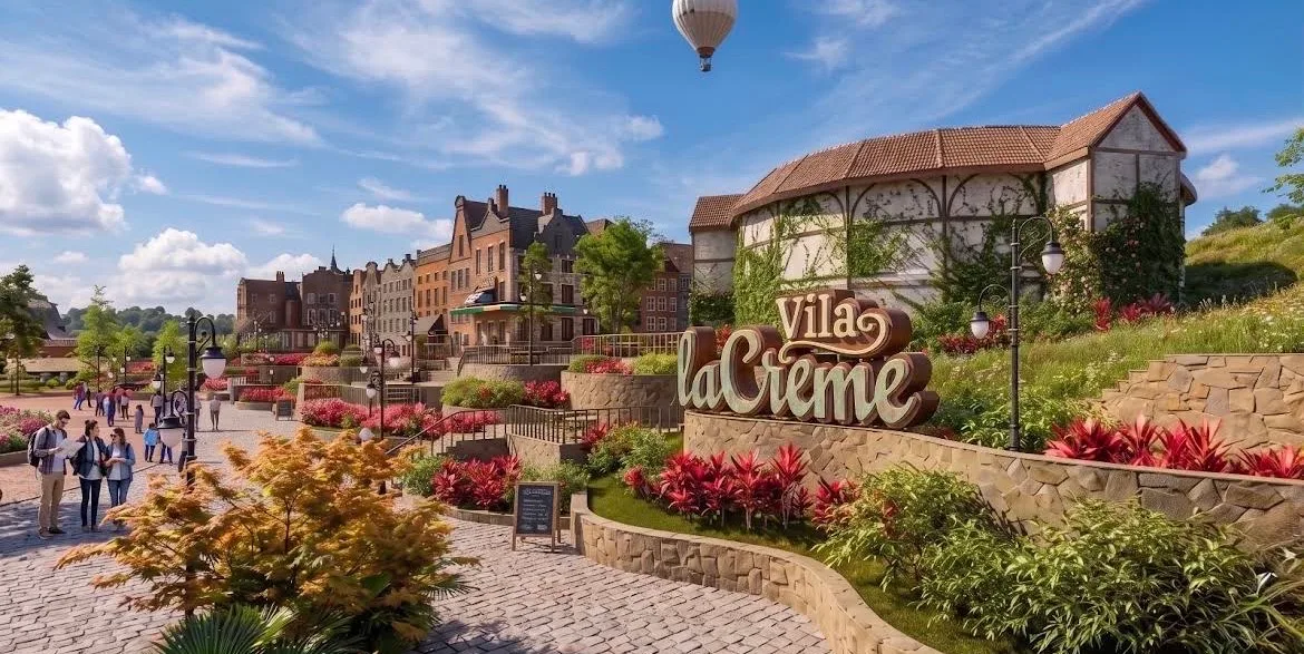 Imagem de referência de uma vila temática com jardins e a identificação Vila laCreme.